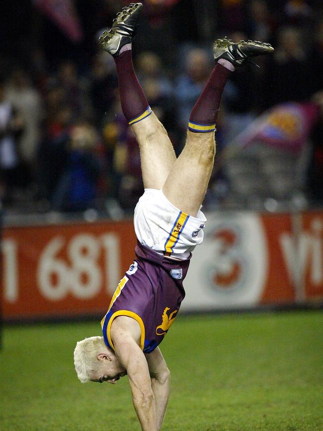 The famous Jason Akermanis handstand.