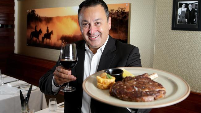 Black Hide’s director John Gambaro shows off the restaurants award winning steak.  Picture: Chris McCormack.
