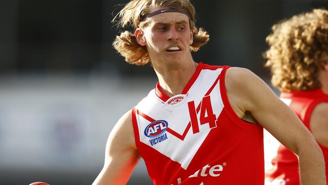 MELBOURNE, AUSTRALIA - MAY 15: Hugo Hall-Kahan of the Young Guns runs with the ball during the match between the Colgate Young Guns and Vic Country U18 at Ikon Park on May 15, 2022 in Melbourne, Australia. (Photo by Daniel Pockett/AFL Photos/via Getty Images )