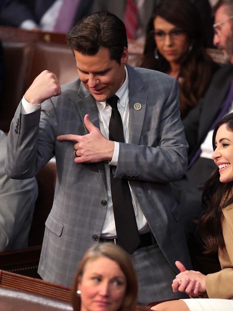 Matt Gaetz flexes his arm after getting into an argument with Mike Rogers during the fourth day of elections for Speaker. Picture: AFP