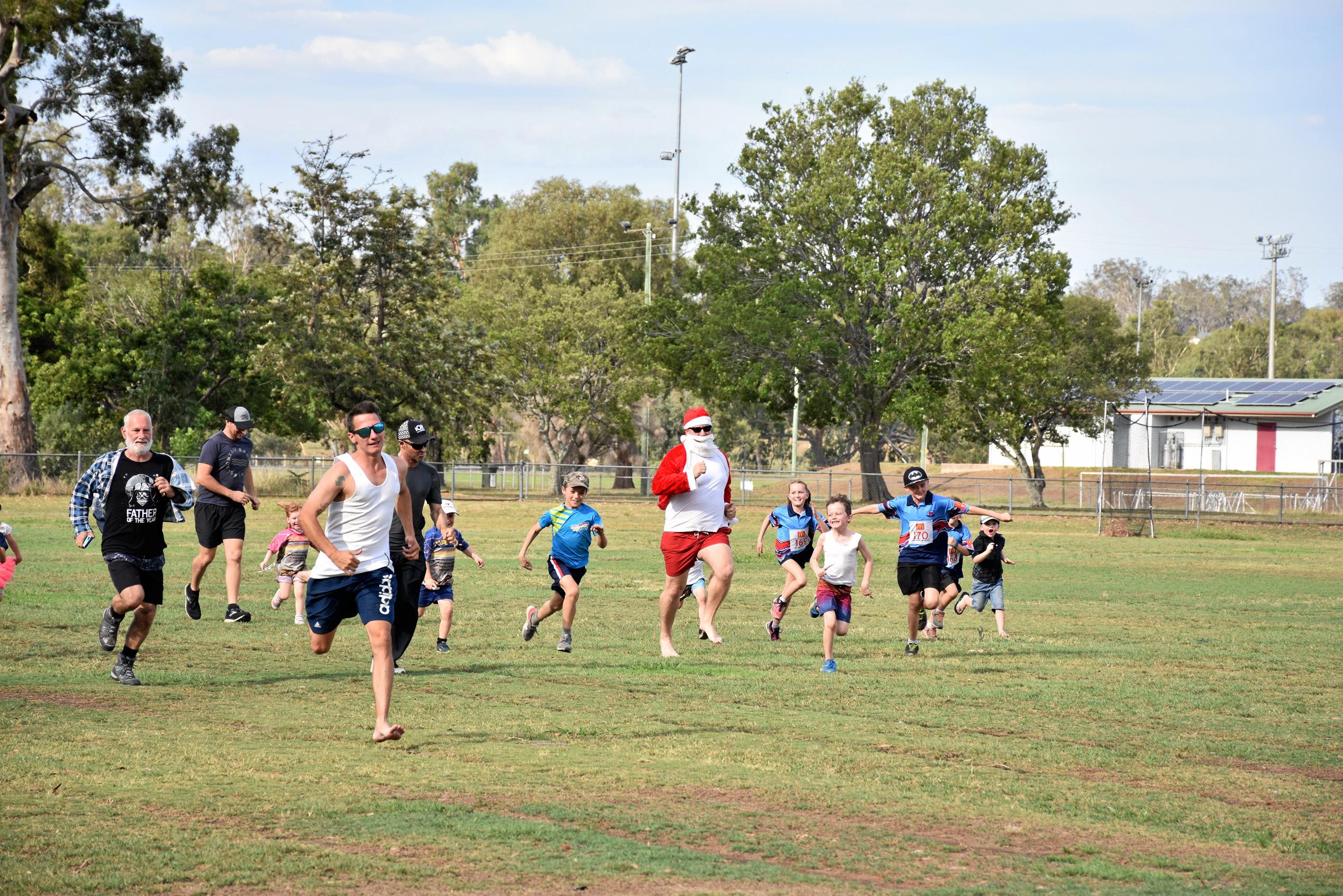 Athletics isn't complete without a race against Santa. Picture: Emily Clooney