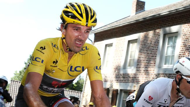 The yellow jersey of Fabian Cancellara struggles to get up the last climb - the Mur de Huy after being hurt in mass crash earlier in the stage. Picture: Sarah Reed.