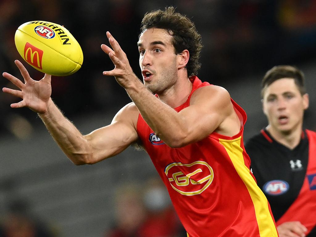 The Suns leave the field after a win during the 2023 AFL Round 12 News  Photo - Getty Images