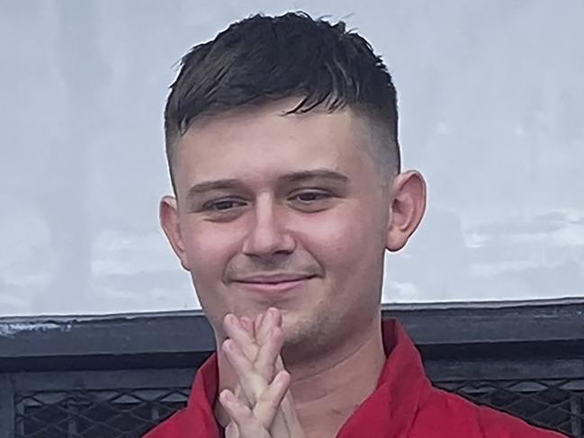 This handout picture taken and released on June 6, 2023 by the Aceh Ministry of Justice and Human Rights regional office shows Australian citizen Bodhi Mani Risby-Jones gesturing during his release at the Sinabang prison in Simeuleu on 6 June 2023, after reconciling with the victim of his rampage last April while he was drunk, and paid a compensation fee of over 16,000 USD. (Photo by Handout / Aceh Ministry of Justice and Hum / AFP) / RESTRICTED TO EDITORIAL USE - MANDATORY CREDIT 