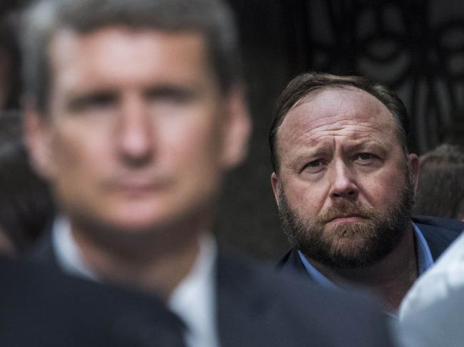 Alex Jones of Infowars at a Senate hearing that featured Jack Dorsey, left, the CEO of Twitter, and Sheryl Sandberg, a top Facebook executive. Picture: Tom Williams/Congressional Quarterly/Zuma Press