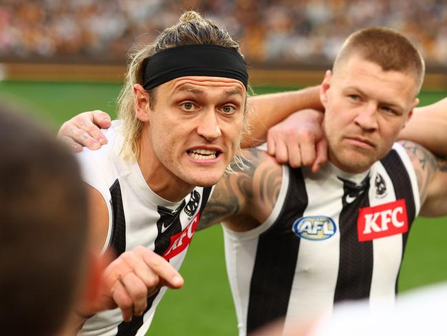 MELBOURNE, AUSTRALIA - JULY 20: Darcy Moore of the Magpies gives instructions during the round 19 AFL match between Hawthorn Hawks and Collingwood Magpies at Melbourne Cricket Ground on July 20, 2024 in Melbourne, Australia. (Photo by Graham Denholm/AFL Photos/via Getty Images)