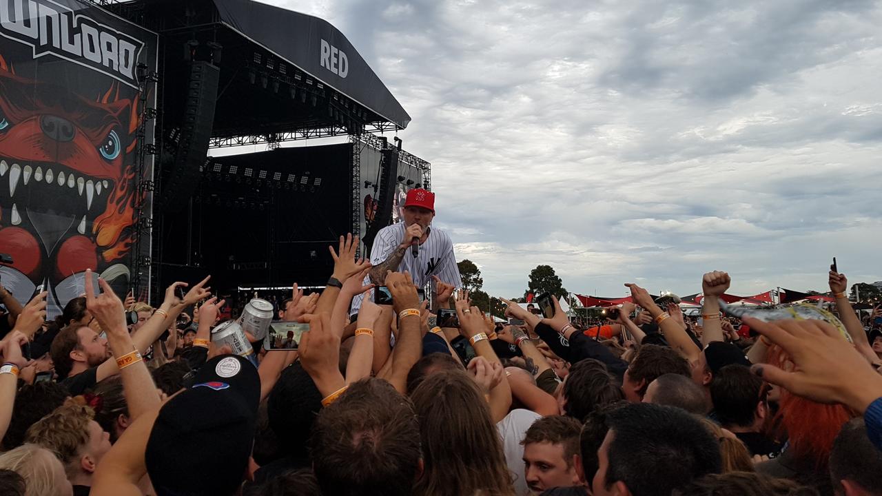 Fred Durst from Limp Bizkit gets among the crowd at Download Festival. Picture: Kiel Egging.