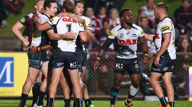 SYDNEY, AUSTRALIA - MAY 18: David Simmons of the Panthers celebrates with his team mates after scoring a try during the round 10 NRL match between the Manly Sea Eagles and the Penrith Panthers at Brookvale Oval on May 18, 2015 in Sydney, Australia. (Photo by Mark Kolbe/Getty Images)