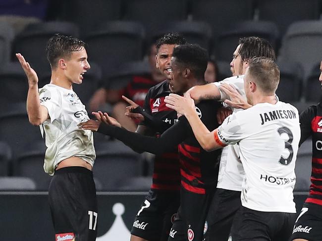 SYDNEY, AUSTRALIA - NOVEMBER 22: Denis Genreau of Melbourne City FC scuffles with Wanderers players during the round 7 A-League match between the Western Sydney Wanderers and Melbourne City at Bankwest Stadium on November 22, 2019 in Sydney, Australia. (Photo by Matt King/Getty Images)