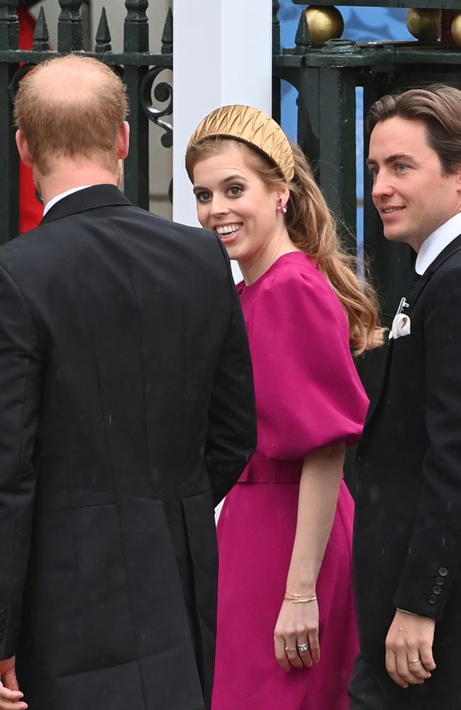 Princess Beatrice and husband Edoardo Mapelli Mozzi arrive at the Coronation of King Charles III with cousin Prince Harry. Picture: Stuart C. Wilson/Getty Images
