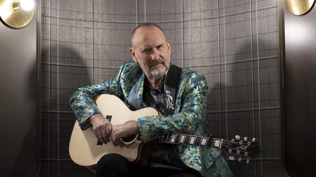 Singer-songwriter Colin Hay backstage, brand-new Maton guitar in hand, before performing at the 2022 Melbourne Cup on Tuesday, November 1. Picture: Arsineh Houspian
