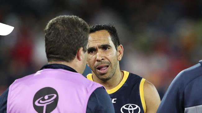 Eddie Betts with medical staff at three-quarter time against Collingwood. Picture: Sarah Reed