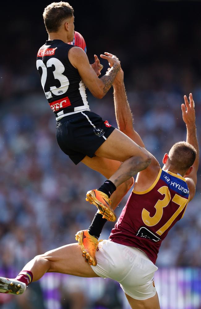 Norm Smith medallist Bobby Hill climbs on Brandon Starcevich during last year’s Grand Final. Picture: Michael Willson/AFL Photos via Getty Images