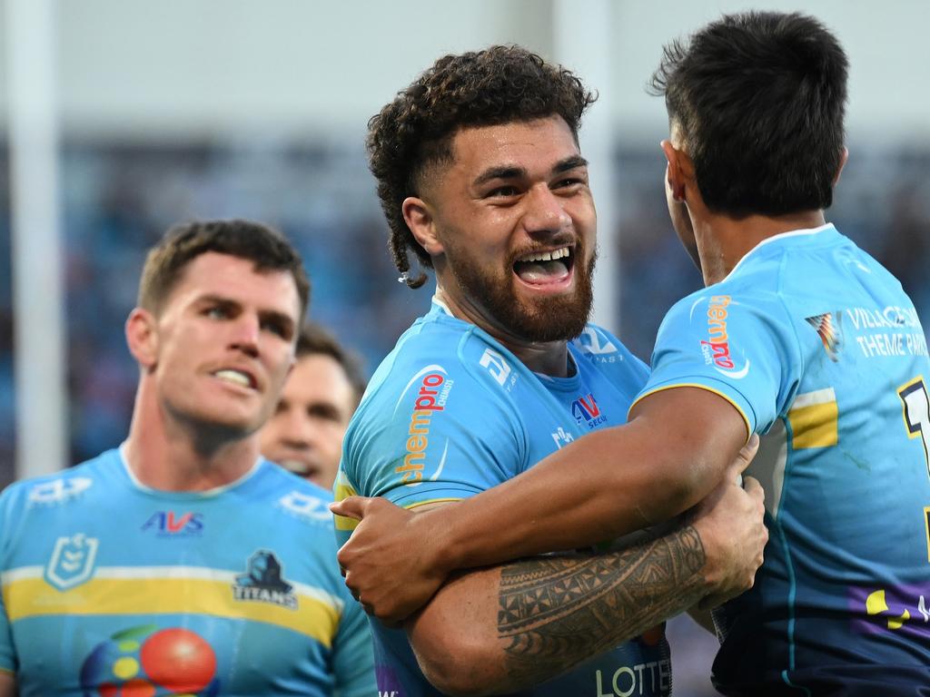 Jojo Fifita of the Titans celebrates scoring a try with Keano Kini of the Titans during the round 22 NRL match. (Photo by Matt Roberts/Getty Images)