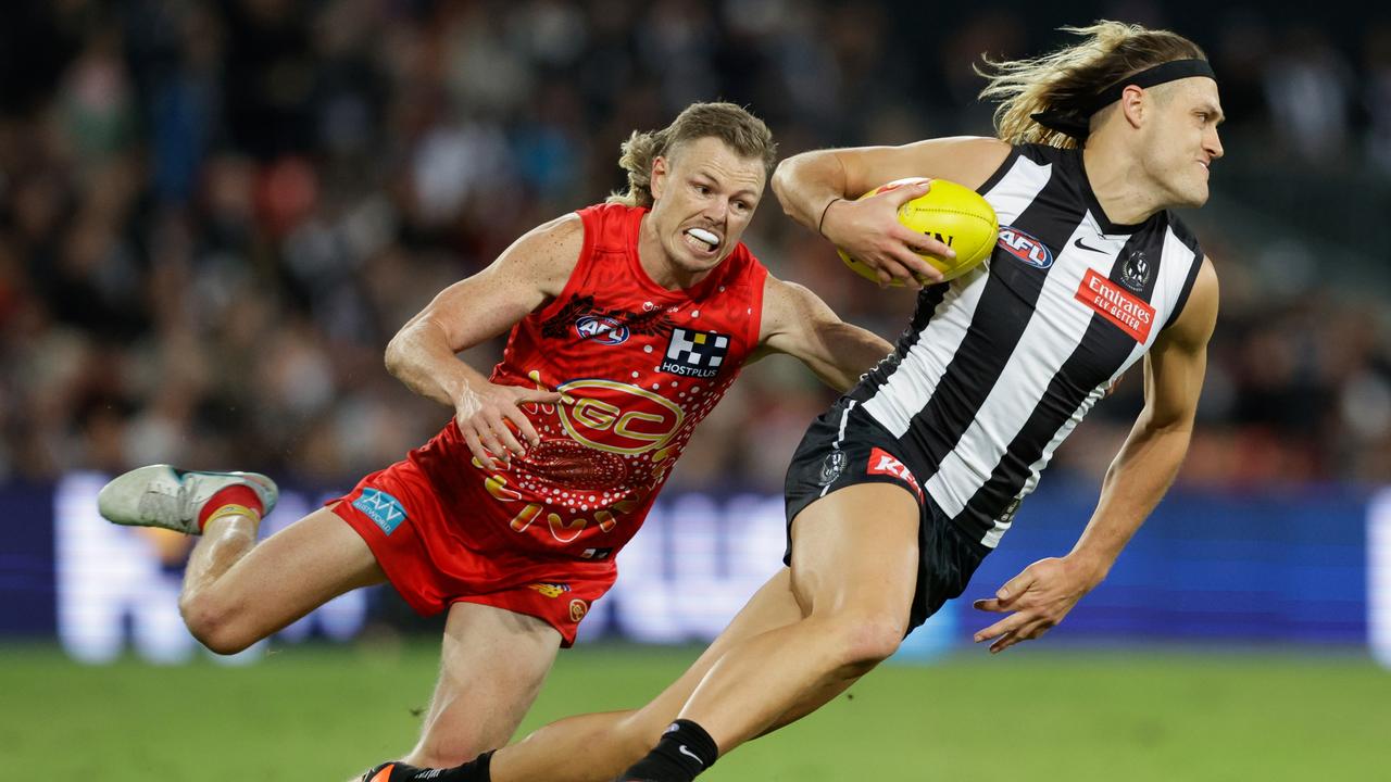 GOLD COAST, AUSTRALIA - JULY 01: Darcy Moore of the Magpies in action during the 2023 AFL Round 16 match between the Gold Coast Suns and the Collingwood Magpies at Heritage Bank Stadium on July 1, 2023 in the Gold Coast, Australia. (Photo by Russell Freeman/AFL Photos via Getty Images)