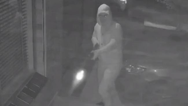 CCTV footage has captured the moment two masked men opened fire into the family home of alleged Melbourne underworld figure Mohammed Charif Oueida. Source: 9News