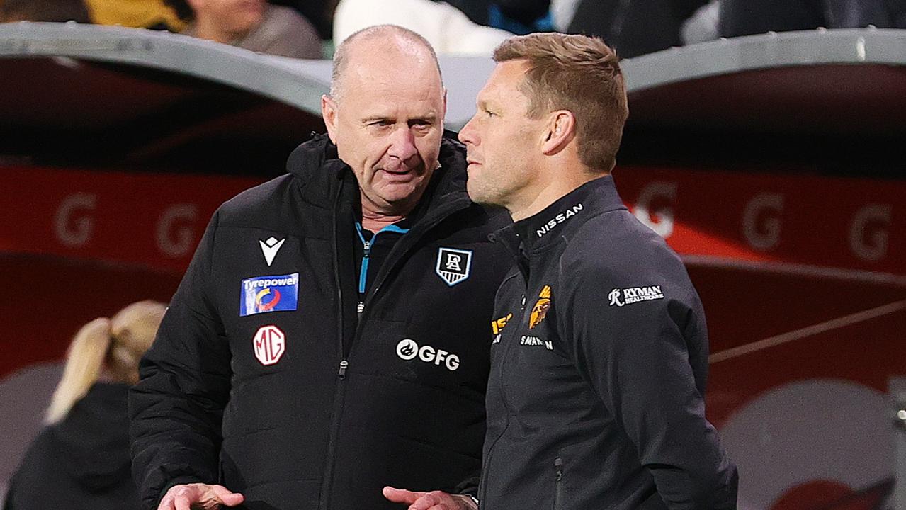 ADELAIDE, AUSTRALIA - SEPTEMBER 13: Ken Hinkley, Senior Coach of the Power with Sam Mitchell, Senior Coach of the Hawks after the match during the 2024 AFL Second Semi Final match between the Port Adelaide Power and the Hawthorn Hawks at Adelaide Oval on September 13, 2024 in Adelaide, Australia. (Photo by Sarah Reed/AFL Photos via Getty Images)