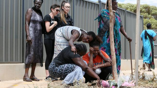 Friends and family mourn the death of Bor Mabil and lay flowers at the tragic site. Picture: Emma Brasier 