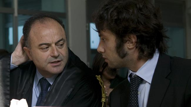 Anti-mafia prosecutor Nicola Gratteri, left attends a trial related to a bloody vendetta between clans of the 'Ndrangheta in Italy. Picture: AFP