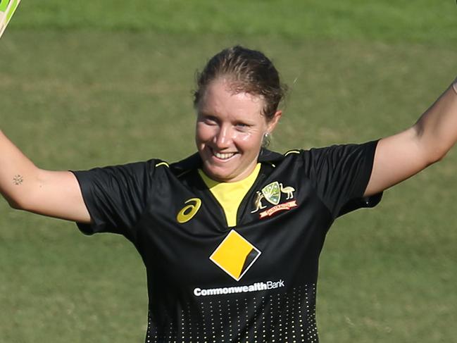 SYDNEY, AUSTRALIA - OCTOBER 02: Alyssa Healy of Australia celebrates scoring a century during game three of the Women's Twenty20 International Series between Australia and Sri Lanka at North Sydney Oval on October 02, 2019 in Sydney, Australia. (Photo by Jason McCawley/Getty Images)