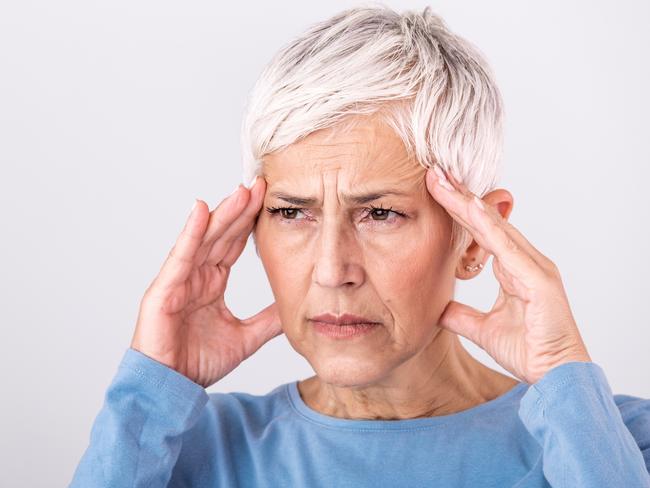 MENTAL HEALTH -  Woman suffering from stress or a headache grimacing in pain. Senior woman with migraine feeling unwell. Portrait of an attractive senior woman with a headache, feeling pain Picture: Istock