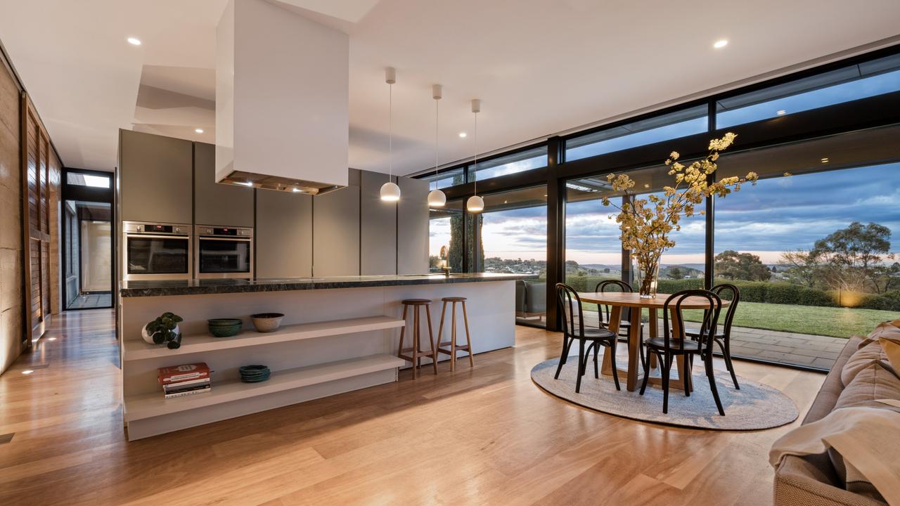 Many of the rooms look out to the garden and surrounding mountains.