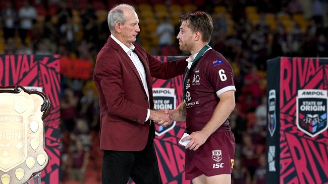 Cameron Munster of the Maroon with Wayne Bennett. Photo by Bradley Kanaris/Getty Images