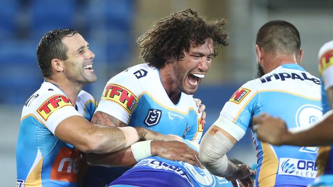 Gold Coast star Kevin Proctor celebrates a try. Picture: Getty