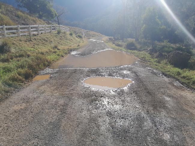 More dangerous potholes line the inside just passed the eastern grid at the start of the Gorge.