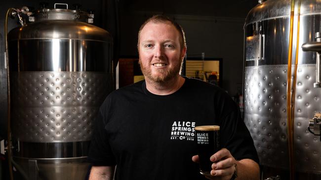 Alice Springs Brewing Co has gone from producing 40,000L in it’s first year to almost 250,000L in the year to date thanks to a pivot it made during Covid-19. Pictured is founder Kyle Pearson with a brew.