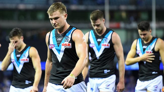 Power co-captain Ollie Wines walks off Marvel Stadium after his side’s disappointing loss to North Melbourne. Picture: Quinn Rooney/Getty