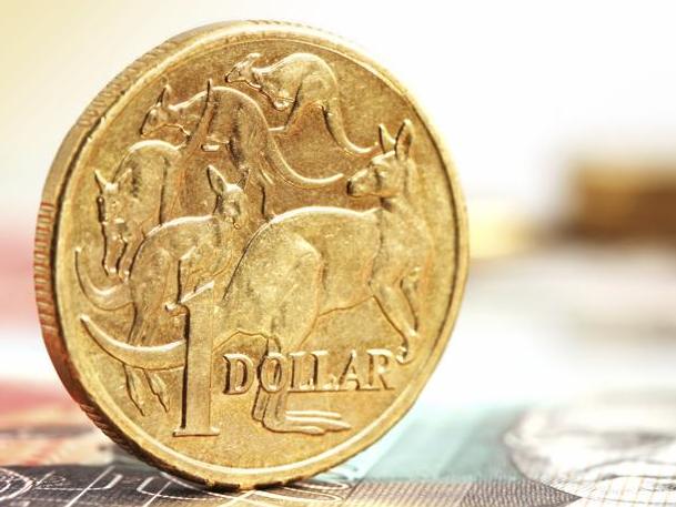 Aussie one dollar coins, on a twenty dollar note.