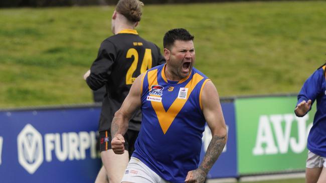 Marc Holt celebrates after kicking truly in his final game. Picture: Valeriu Campan