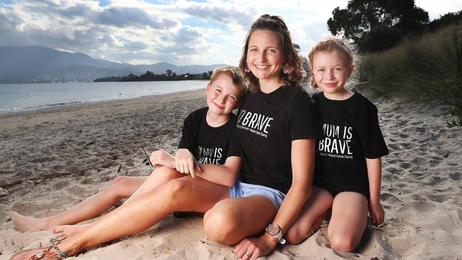 Claire with children Campbell 10 and Elsie 7. Claire Symons of Hobart who faced breast cancer in her 30s and is now wanting to raise awareness about the long term recovery post cancer. Picture: Nikki Davis-Jones