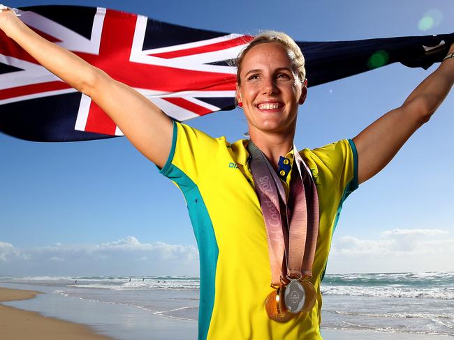 Bronte Campbell and the Australian Dolphins swim team gather for the media after their most successful Commonwealth Games. Pics Adam Head