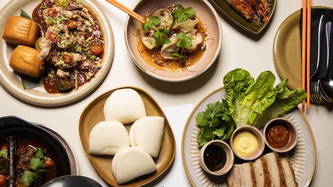 Crispy pork belly bao, dumplings and other dishes at Paper Tiger on Rundle St.