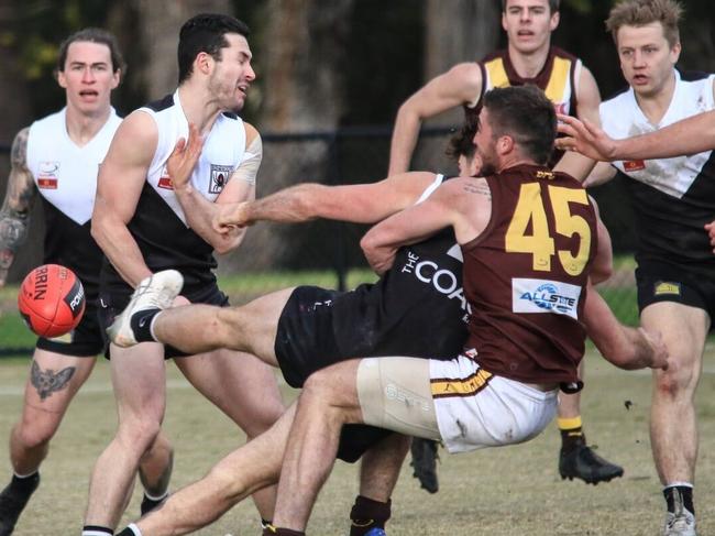 Ringwood captain Trent Farmer in brought down in a tackle in the Eastern Football League (EFL). Picture: Davis Harrigan