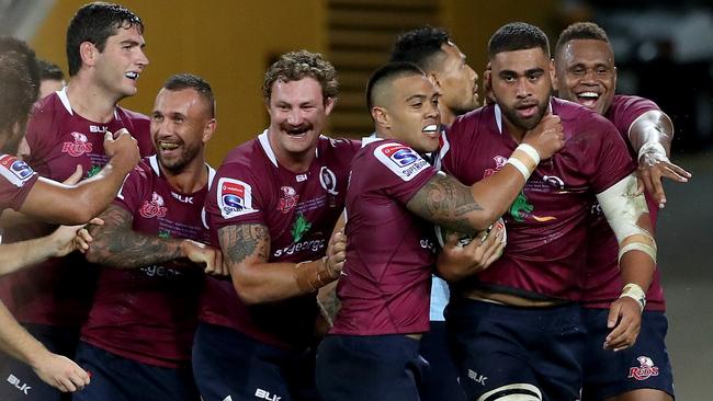 Queensland Reds players sporting their heritage jersey last year.
