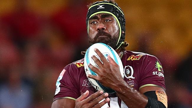 BRISBANE, AUSTRALIA - MARCH 12: Seru Uru of the Reds catches during the round four Super Rugby Pacific match between the Queensland Reds and the Fijian Drua at Suncorp Stadium on March 12, 2022 in Brisbane, Australia. (Photo by Chris Hyde/Getty Images)