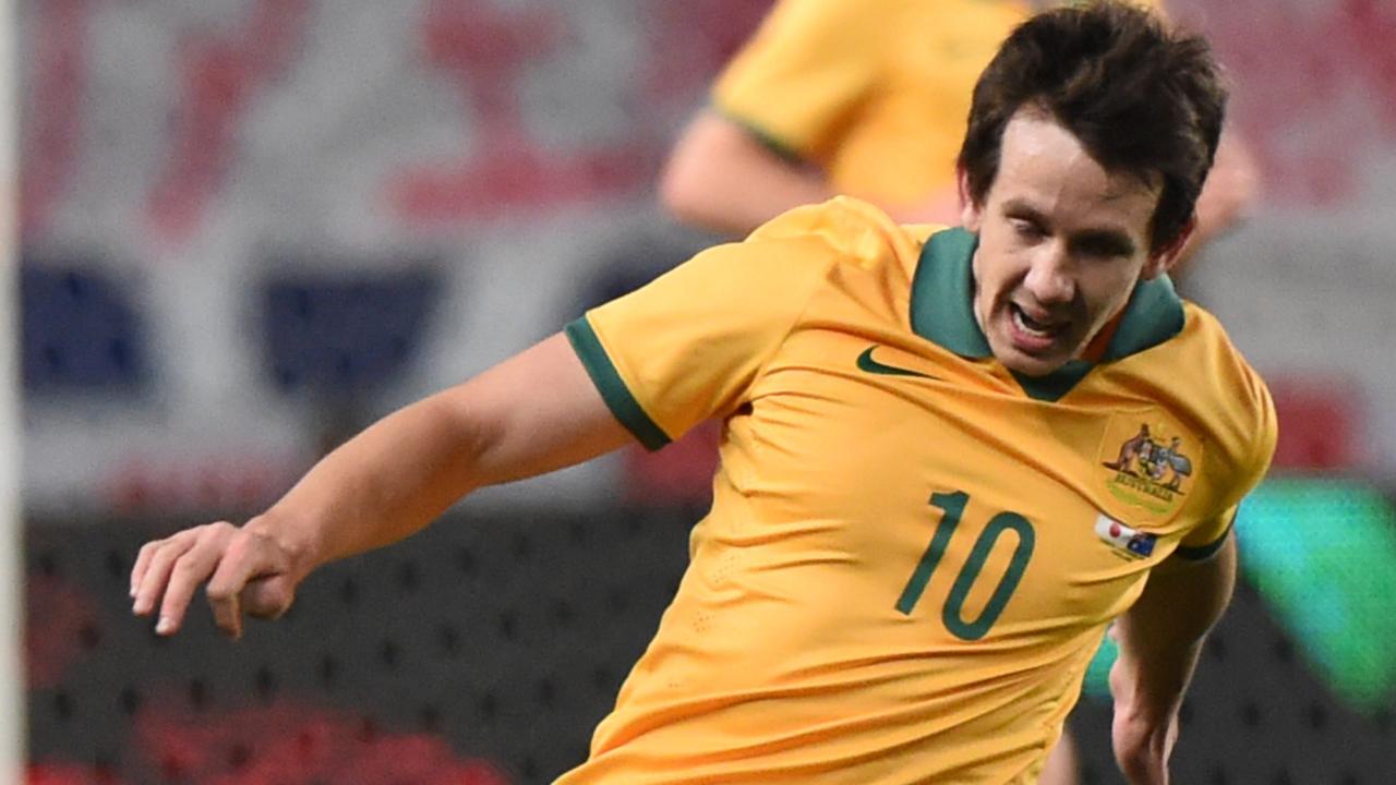 OSAKA, JAPAN - NOVEMBER 18:Robbie Kruse of Australia dribbles the ball during the international friendly match between Japan and Australia at Nagai Stadium on November 18, 2014 in Osaka, Japan. (Photo by Kaz Photography/Getty Images)