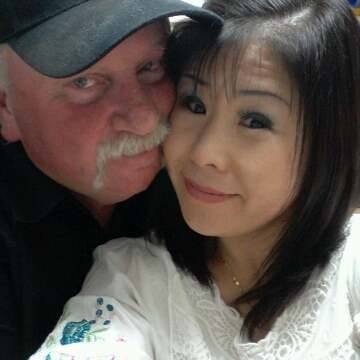 Ms Zhang with her husband David Simmons. Picture: Facebook