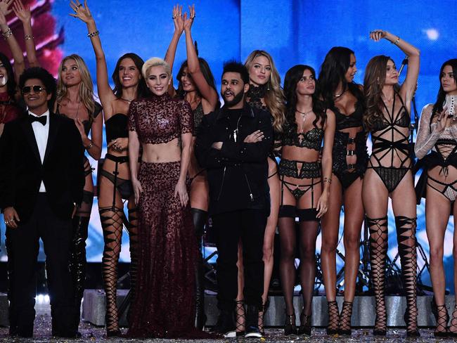 Bruno Mars, Lady Gaga and TThe Weeknd cheer alongside Victoria’s Secret Angelsrduring the 2016 Victoria’s Secret Fashion Show at the Grand Palais in Paris. Picture: AFP