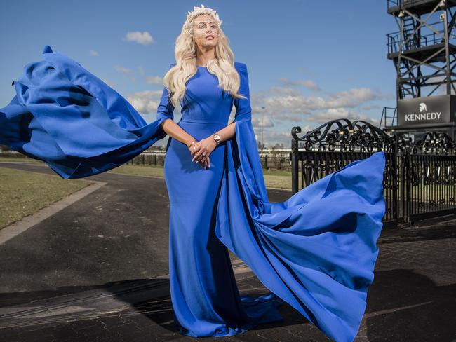 Jaimee Belle at Flemington wearing Alex Perry and Gregory Ladner from Myer as the VRC announced luxury watch and jewellery retailer Kennedy as The Oaks Day sponsor. Picture: Jason Edwards