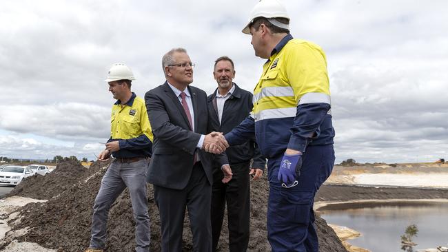 Prime Minister Scott Morrison shakes hands with Matt Allen during a visit to Northlink WA. Picture: AAP Image/ Will Russell