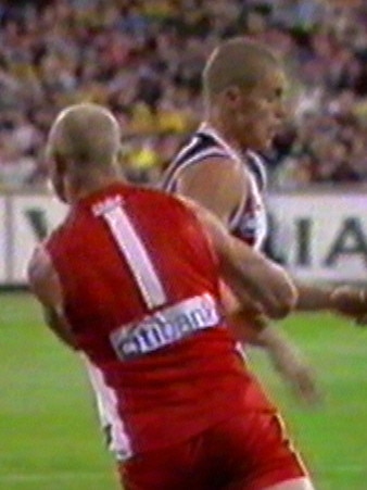 Barry Hall punches Matt Maguire during the 2005 preliminary final. Picture: Channel 10