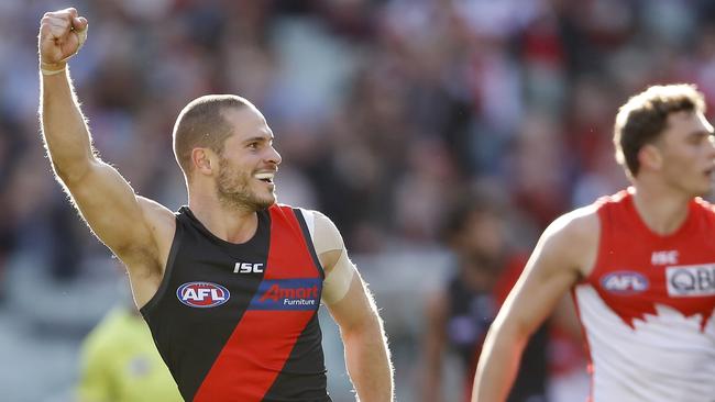 MELBOURNE, AUSTRALIA - JULY 06: David Zaharakis of the Bombers celebrates a goal during the 2019 AFL round 16 match between the Essendon Bombers and the Sydney Swans at the Melbourne Cricket Ground on July 06, 2019 in Melbourne, Australia. (Photo by Dylan Burns/AFL Photos via Getty Images)