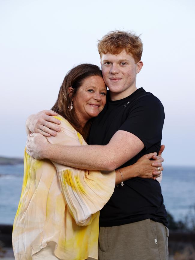 Son Tom and his very relieved mum Rachael. More than half of NSW's public schools don't have an AED on site, and in the regions it's less than a third. Picture: Jonathan Ng