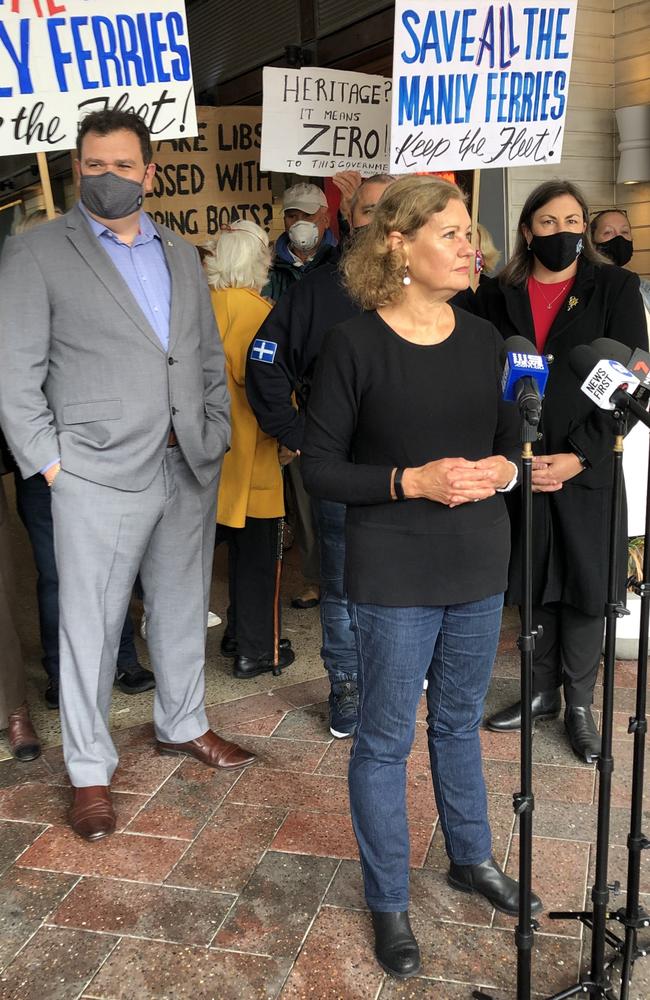 Northern Beaches deputy mayor Candy Bingham speaking to the media at Manly Wharf with Maritime Union of Australia’s Paul Garrett (left), just before boarding the last voyage of the Queenscliff. Picture: Jim O'Rourke