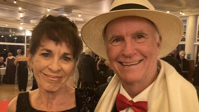 Kerrie McFlinn and Mick Sandy celebrate at the Gympie RSL Masked Ball, April 29 2023.