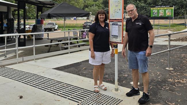 Arcadia Village Hotel owner John Shepley and Arcadia Newsagency owner Karen Chapple at the unused $120,000 bus stop at on Armand Way. They say a bureaucratic impasse has adversely impacted local businesses. Mr Shepley says one of the most maddening aspects of the debacle is not being able to talk to a relevant government official, saying contacting News Corp was his last-remaining option. Picture: Supplied